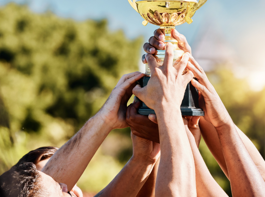 Rugby, champion or hands of team with trophy for achievement, goals or group success together. Cele